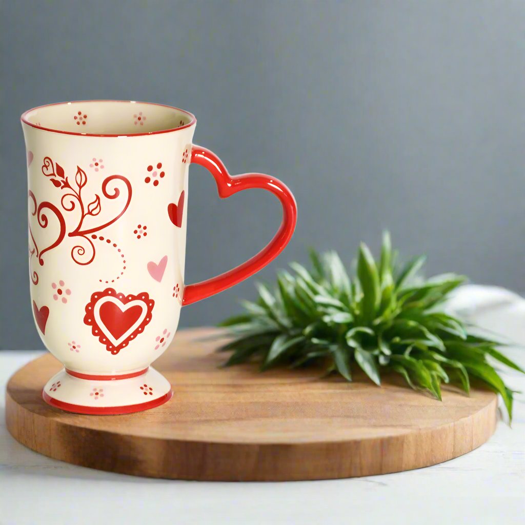 18 oz Romance Mug Heart Handle & Lid-It on table