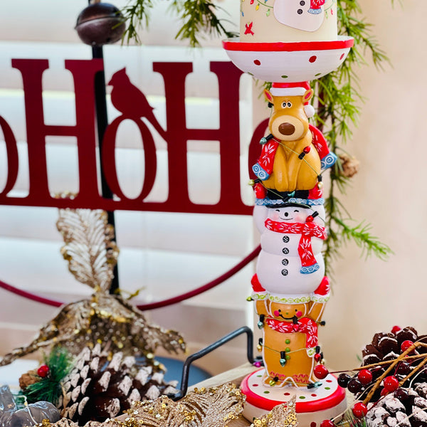 close-up view of temp-tations Resin Pillar Candle Holders, Set of 2 in Christmas Winter Whimsy