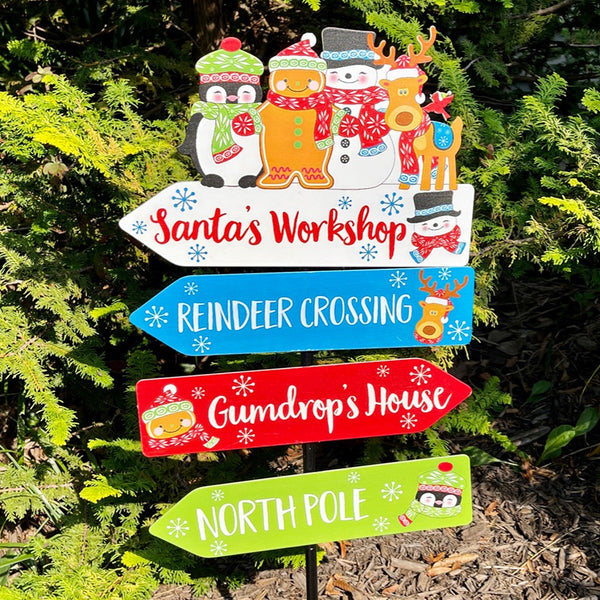 outdoor scene with temp-tations metal holiday yard sign with stake in Christmas Winter Whimsy