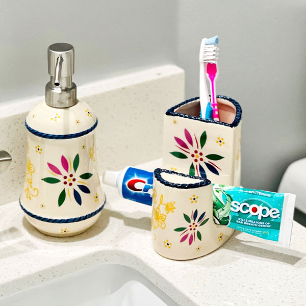 Temp-tations Essentials Soap Dispenser & Sponge Holder in Classic Confetti on a bathroom sink
